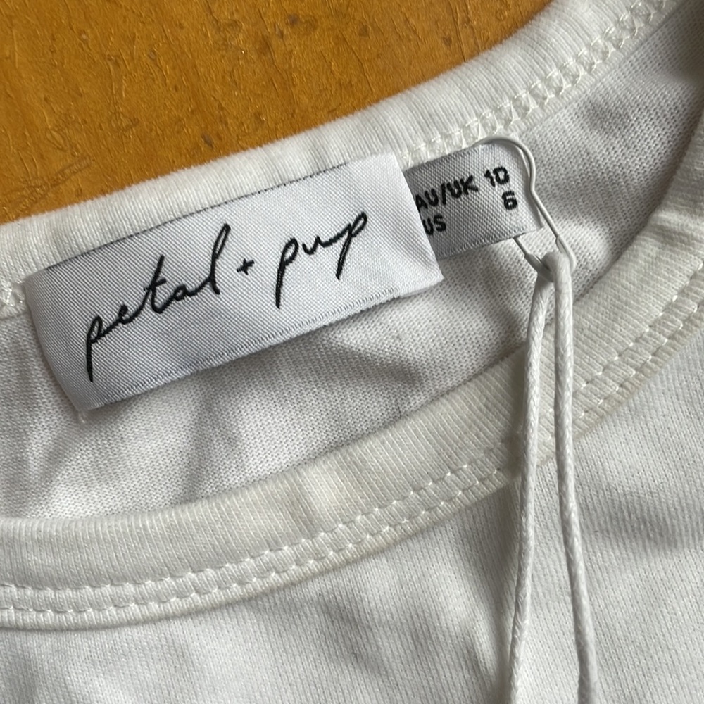 New with tags muscle crop top. Light shoulder pads. Size 6 petal and pup brand.